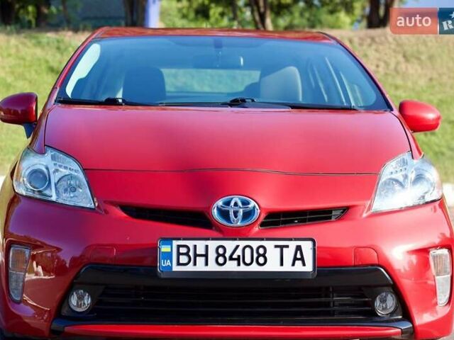 Красный Тойота Приус, объемом двигателя 1.8 л и пробегом 176 тыс. км за 10800 $, фото 1 на Automoto.ua