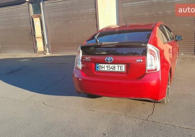 Красный Тойота Приус, объемом двигателя 1.8 л и пробегом 200 тыс. км за 10500 $, фото 4 на Automoto.ua