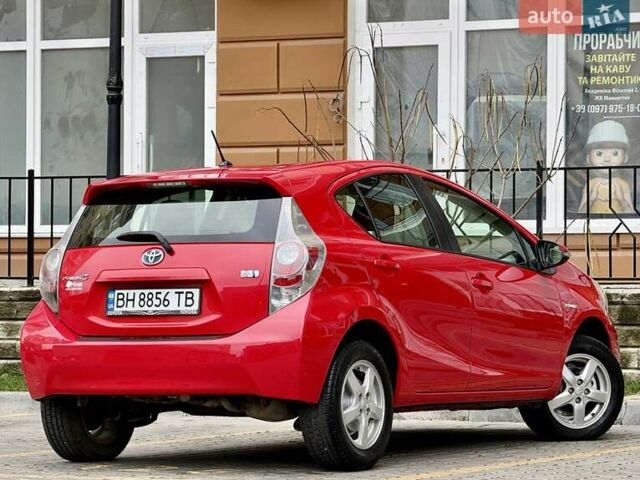 Червоний Тойота Пріус, об'ємом двигуна 1.5 л та пробігом 208 тис. км за 9999 $, фото 26 на Automoto.ua