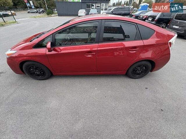 Красный Тойота Приус, объемом двигателя 1.8 л и пробегом 167 тыс. км за 12500 $, фото 2 на Automoto.ua