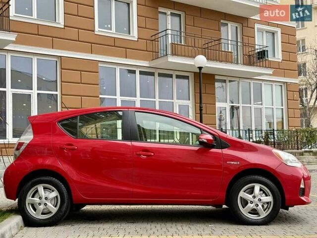 Червоний Тойота Пріус, об'ємом двигуна 1.5 л та пробігом 208 тис. км за 9999 $, фото 2 на Automoto.ua