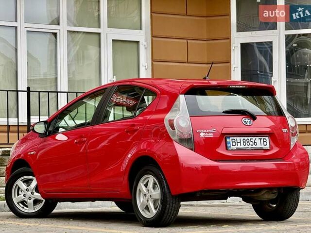 Червоний Тойота Пріус, об'ємом двигуна 1.5 л та пробігом 208 тис. км за 9999 $, фото 34 на Automoto.ua