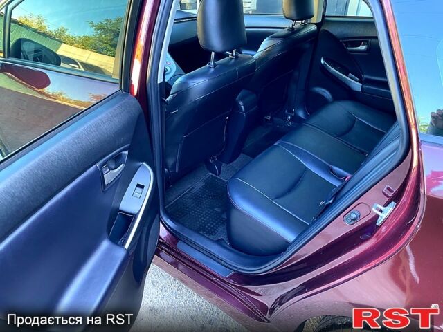 Красный Тойота Приус, объемом двигателя 1.8 л и пробегом 260 тыс. км за 10900 $, фото 4 на Automoto.ua