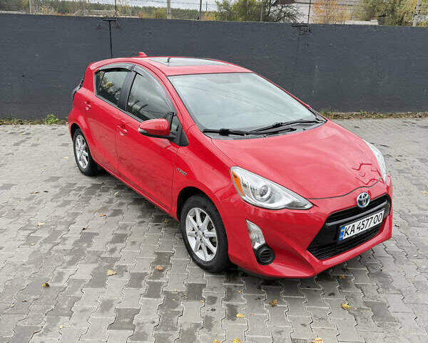 Красный Тойота Приус, объемом двигателя 1.5 л и пробегом 95 тыс. км за 11800 $, фото 1 на Automoto.ua