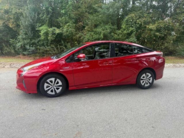 Красный Тойота Приус, объемом двигателя 1.8 л и пробегом 77 тыс. км за 8000 $, фото 4 на Automoto.ua