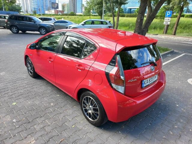 Красный Тойота Приус, объемом двигателя 1.5 л и пробегом 82 тыс. км за 11900 $, фото 3 на Automoto.ua