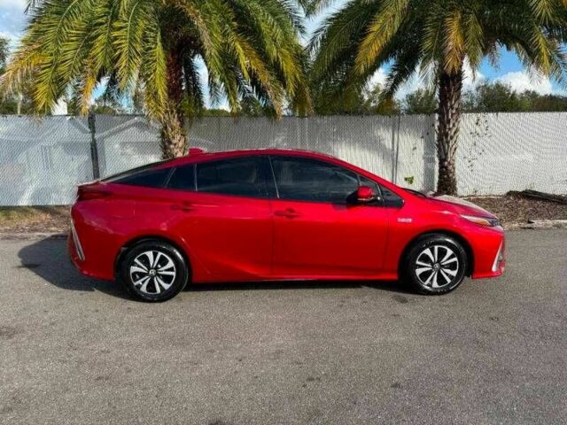 Красный Тойота Приус, объемом двигателя 1.8 л и пробегом 43 тыс. км за 5000 $, фото 5 на Automoto.ua