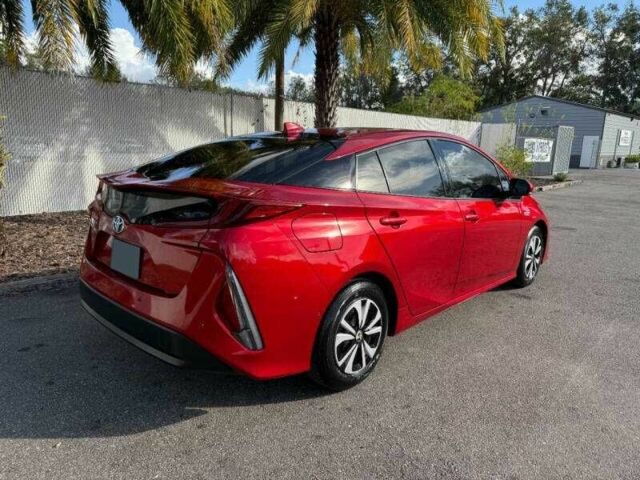 Красный Тойота Приус, объемом двигателя 1.8 л и пробегом 43 тыс. км за 5000 $, фото 4 на Automoto.ua