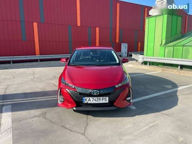 Красный Тойота Приус, объемом двигателя 1.8 л и пробегом 136 тыс. км за 17800 $, фото 1 на Automoto.ua