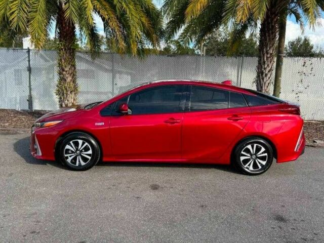 Красный Тойота Приус, объемом двигателя 1.8 л и пробегом 43 тыс. км за 5000 $, фото 1 на Automoto.ua