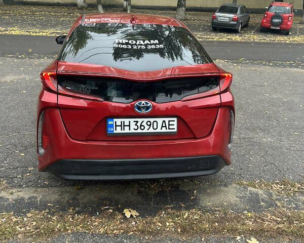 Красный Тойота Приус, объемом двигателя 1.8 л и пробегом 241 тыс. км за 16800 $, фото 1 на Automoto.ua
