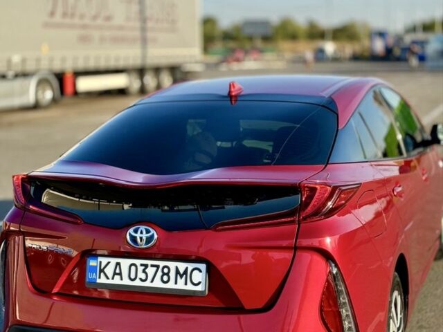 Красный Тойота Приус, объемом двигателя 1.8 л и пробегом 126 тыс. км за 19000 $, фото 1 на Automoto.ua