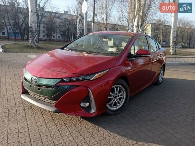 Красный Тойота Приус, объемом двигателя 1.8 л и пробегом 170 тыс. км за 20500 $, фото 1 на Automoto.ua