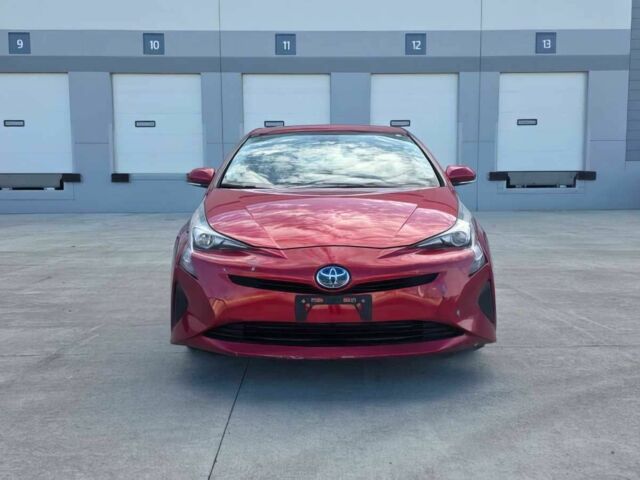 Красный Тойота Приус, объемом двигателя 1.8 л и пробегом 63 тыс. км за 7000 $, фото 1 на Automoto.ua