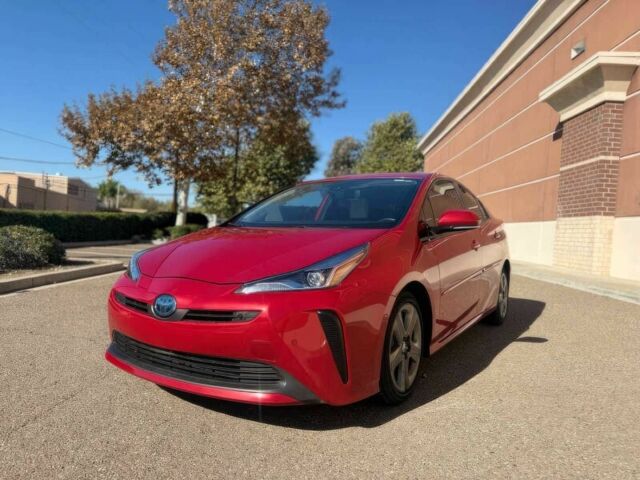 Красный Тойота Приус, объемом двигателя 1.8 л и пробегом 33 тыс. км за 11300 $, фото 2 на Automoto.ua