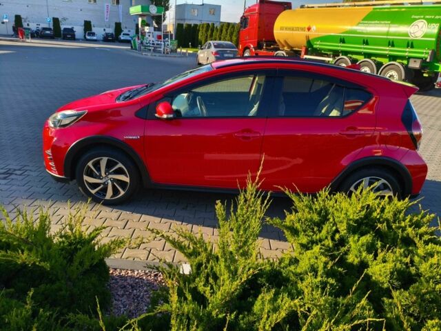 Красный Тойота Приус, объемом двигателя 1.5 л и пробегом 66 тыс. км за 14800 $, фото 5 на Automoto.ua