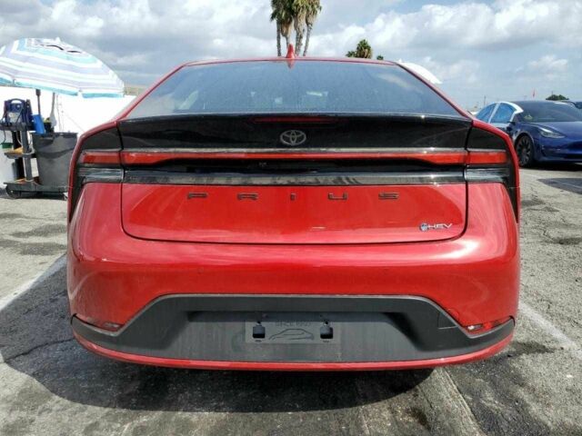 Красный Тойота Приус, объемом двигателя 2 л и пробегом 9 тыс. км за 7900 $, фото 4 на Automoto.ua