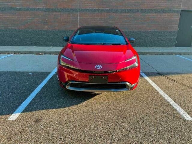 Красный Тойота Приус, объемом двигателя 2 л и пробегом 10 тыс. км за 12000 $, фото 5 на Automoto.ua