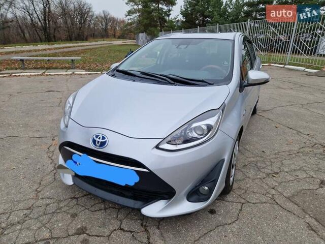 Серый Тойота Приус, объемом двигателя 1.5 л и пробегом 88 тыс. км за 12500 $, фото 4 на Automoto.ua