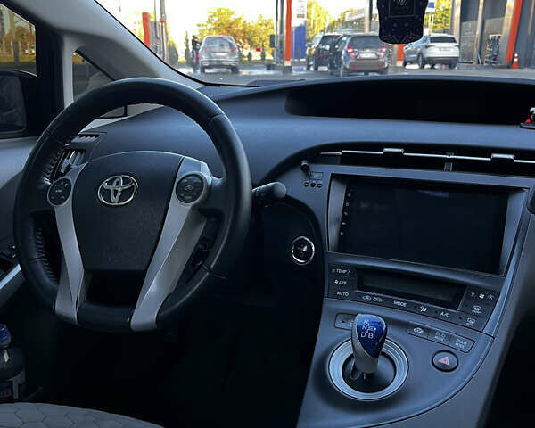 Синий Тойота Приус, объемом двигателя 1.8 л и пробегом 240 тыс. км за 9600 $, фото 10 на Automoto.ua