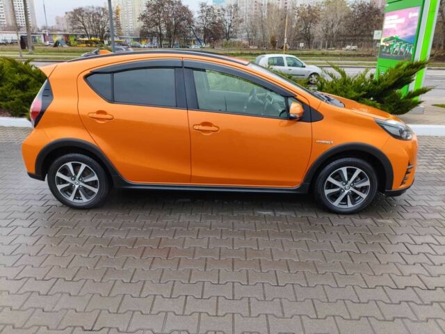 Оранжевый Тойота Приус, объемом двигателя 1.5 л и пробегом 97 тыс. км за 13400 $, фото 1 на Automoto.ua