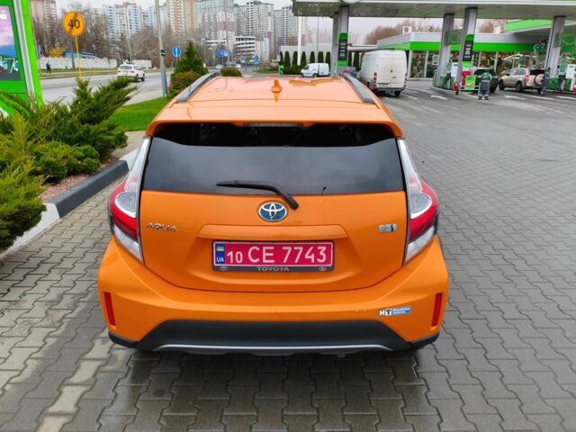 Оранжевый Тойота Приус, объемом двигателя 1.5 л и пробегом 97 тыс. км за 13400 $, фото 3 на Automoto.ua