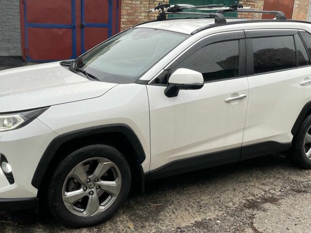 Белый Тойота РАВ 4, объемом двигателя 2 л и пробегом 99 тыс. км за 29500 $, фото 2 на Automoto.ua