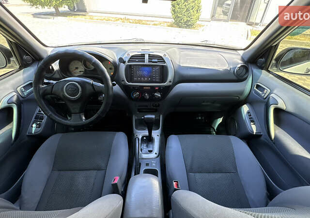 Білий Тойота РАВ 4, об'ємом двигуна 2 л та пробігом 170 тис. км за 6950 $, фото 67 на Automoto.ua