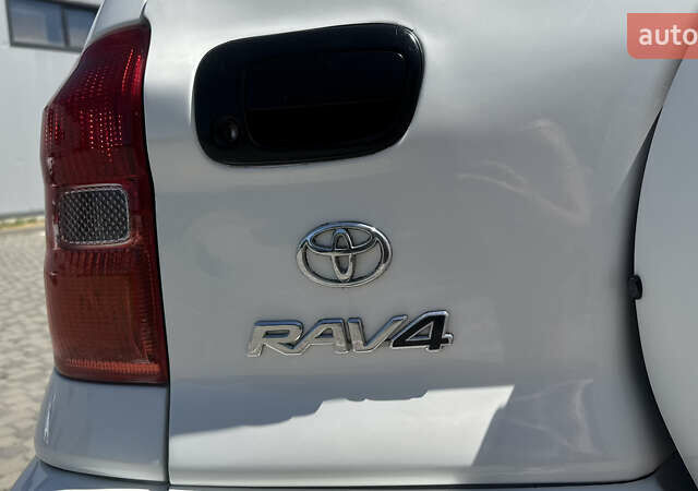 Білий Тойота РАВ 4, об'ємом двигуна 2 л та пробігом 170 тис. км за 6950 $, фото 13 на Automoto.ua