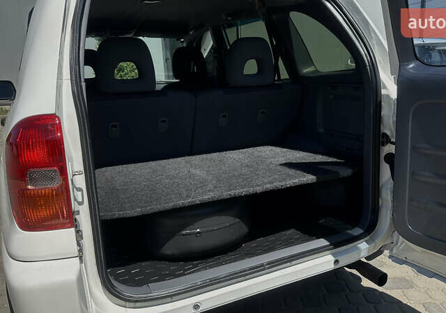 Білий Тойота РАВ 4, об'ємом двигуна 2 л та пробігом 170 тис. км за 6950 $, фото 70 на Automoto.ua