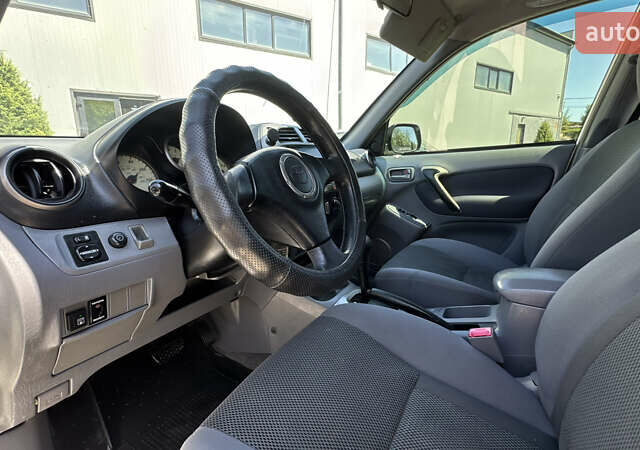 Білий Тойота РАВ 4, об'ємом двигуна 2 л та пробігом 170 тис. км за 6950 $, фото 44 на Automoto.ua