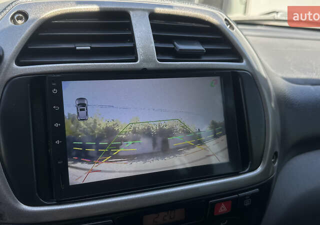 Білий Тойота РАВ 4, об'ємом двигуна 2 л та пробігом 170 тис. км за 6950 $, фото 52 на Automoto.ua