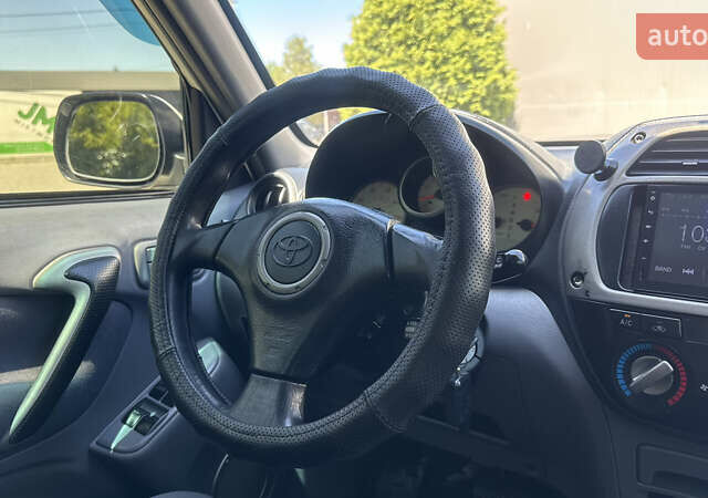 Білий Тойота РАВ 4, об'ємом двигуна 2 л та пробігом 170 тис. км за 6950 $, фото 64 на Automoto.ua