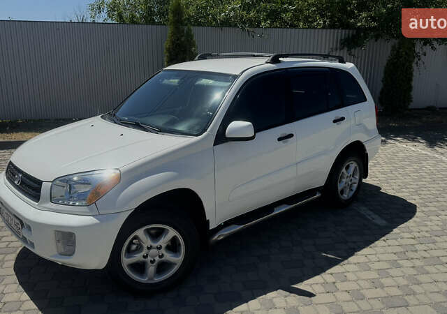 Білий Тойота РАВ 4, об'ємом двигуна 2 л та пробігом 170 тис. км за 6950 $, фото 7 на Automoto.ua