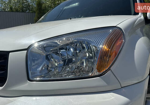 Білий Тойота РАВ 4, об'ємом двигуна 2 л та пробігом 170 тис. км за 6950 $, фото 25 на Automoto.ua