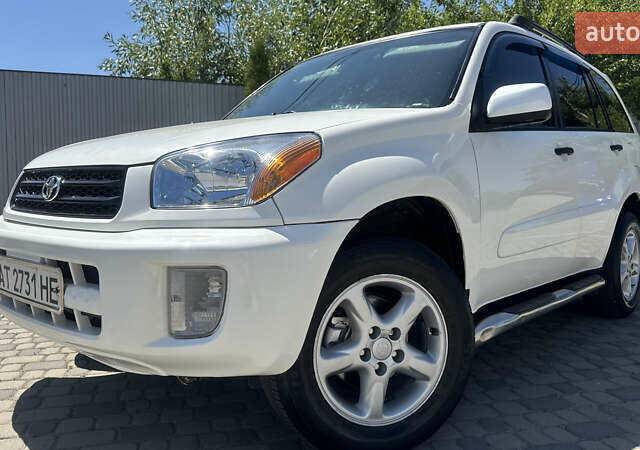 Білий Тойота РАВ 4, об'ємом двигуна 2 л та пробігом 170 тис. км за 6950 $, фото 24 на Automoto.ua