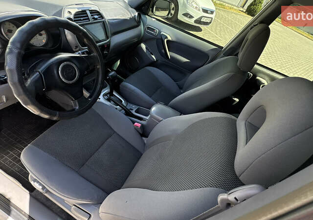 Білий Тойота РАВ 4, об'ємом двигуна 2 л та пробігом 170 тис. км за 6950 $, фото 43 на Automoto.ua