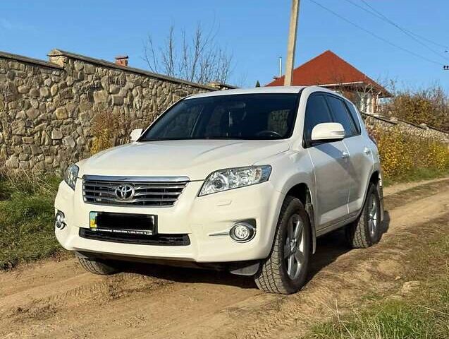 Білий Тойота РАВ 4, об'ємом двигуна 2 л та пробігом 128 тис. км за 15399 $, фото 1 на Automoto.ua