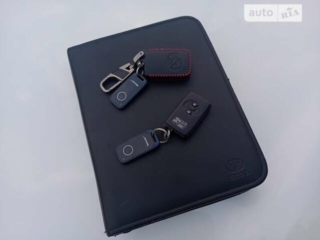 Білий Тойота РАВ 4, об'ємом двигуна 2 л та пробігом 130 тис. км за 14500 $, фото 64 на Automoto.ua