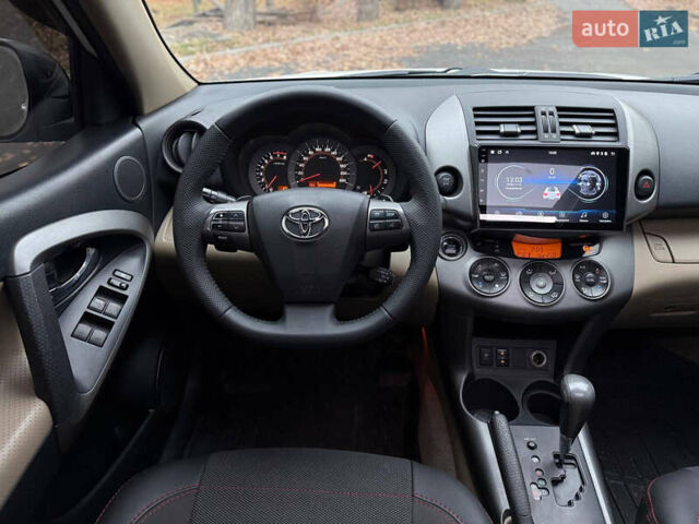 Білий Тойота РАВ 4, об'ємом двигуна 2 л та пробігом 173 тис. км за 12499 $, фото 7 на Automoto.ua