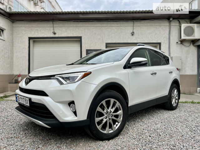 Белый Тойота РАВ 4, объемом двигателя 2.49 л и пробегом 130 тыс. км за 18000 $, фото 1 на Automoto.ua