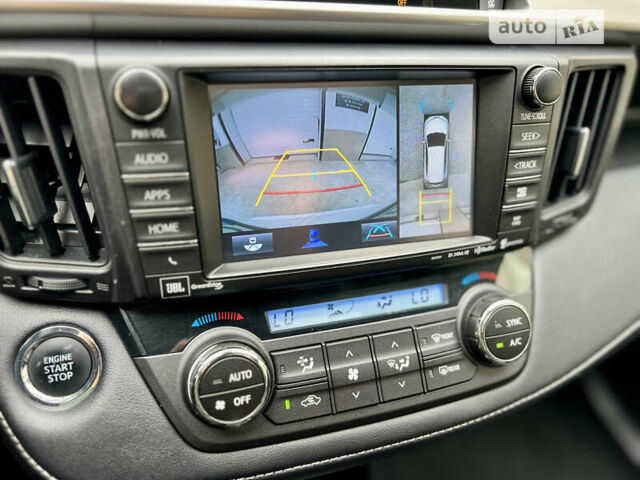 Белый Тойота РАВ 4, объемом двигателя 2.49 л и пробегом 130 тыс. км за 18000 $, фото 28 на Automoto.ua