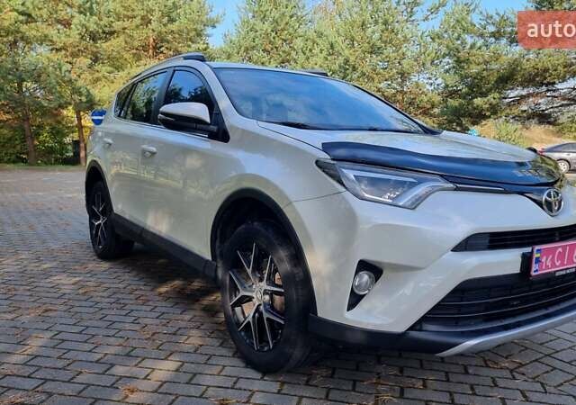 Білий Тойота РАВ 4, об'ємом двигуна 1.99 л та пробігом 204 тис. км за 21700 $, фото 1 на Automoto.ua