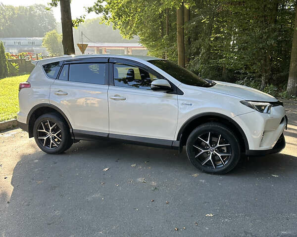 Белый Тойота РАВ 4, объемом двигателя 2.5 л и пробегом 147 тыс. км за 20399 $, фото 3 на Automoto.ua