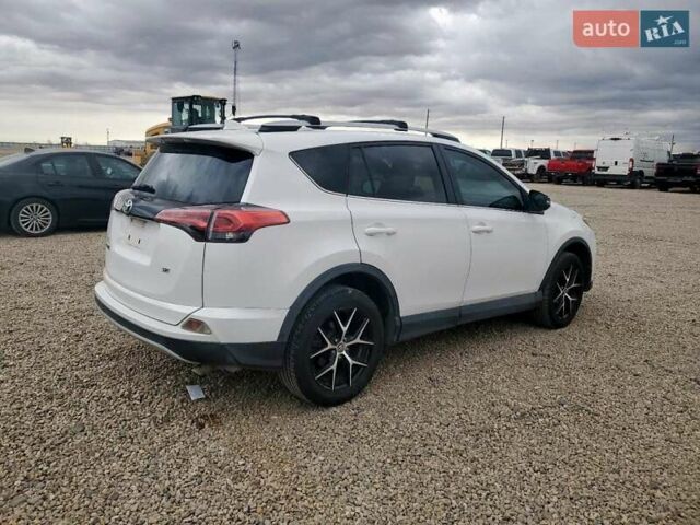 Белый Тойота РАВ 4, объемом двигателя 2.49 л и пробегом 175 тыс. км за 5300 $, фото 3 на Automoto.ua