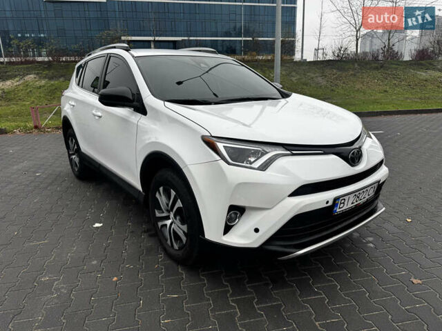 Білий Тойота РАВ 4, об'ємом двигуна 2.49 л та пробігом 173 тис. км за 16100 $, фото 1 на Automoto.ua