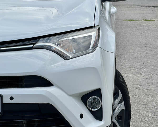 Тойота РАВ 4 2016 у Києві на Automoto.ua Білий Тойота РАВ 4, об'ємом двигуна 2.49 л та пробігом 173 тис. км за 17200 $, фото 65 на Automoto.ua