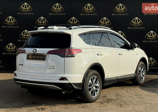 Белый Тойота РАВ 4, объемом двигателя 2.49 л и пробегом 114 тыс. км за 21999 $, фото 5 на Automoto.ua