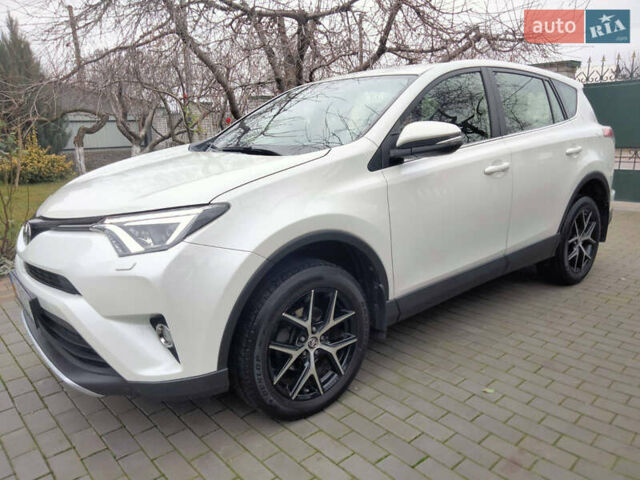 Белый Тойота РАВ 4, объемом двигателя 2.23 л и пробегом 63 тыс. км за 25200 $, фото 3 на Automoto.ua