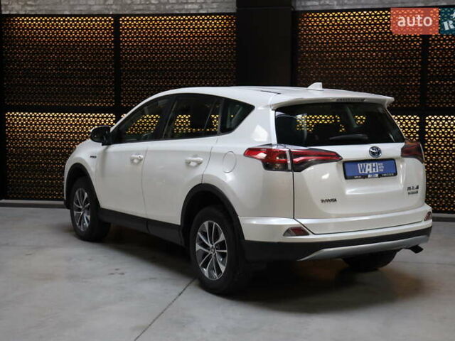 Білий Тойота РАВ 4, об'ємом двигуна 2.49 л та пробігом 72 тис. км за 24000 $, фото 3 на Automoto.ua